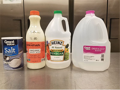 Fig. 04: Photograph of packaged table salt, whole milk, white vinegar, and distilled water.