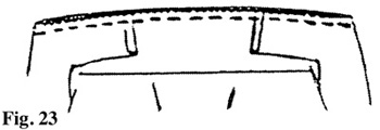 Illustration: Turn the facing right side out and press carefully. Pin facing ends in place at shoulder seams and secure by stitching-in-the-ditch.