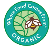 Logo of Where Food Comes From, featuring a teal-colored background top with a bee at the center. The words around the circle read “Where Food Comes From. Organic”.