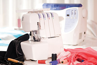 Photograph of an overlock sewing machine.