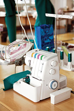 Photograph of an overlock sewing machine.