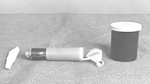 Photo of paper and plastic tubes and a film canister.