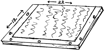 Fig 2. Using a glueboard trap to catch snakes.