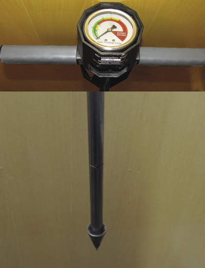  Photograph of a soil penetrometer or compaction meter. 