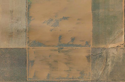 Figure 8: Aerial photograph showing sand deposited on fields.