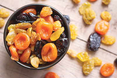 Photograph of a bowl of dried fruit.