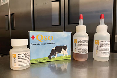 Fig. 02: Photograph of packaged cheese cultures, tablet and liquid rennets, and calcium chloride.