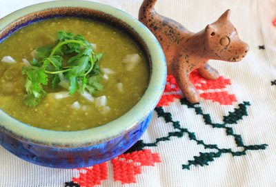 Photo of a bowl of green chile salsa.