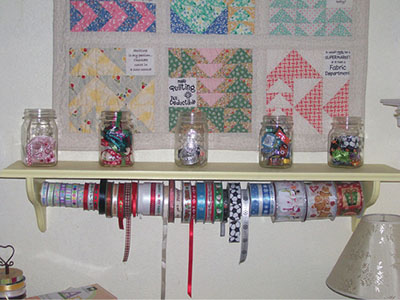 Figure 07: Photograph showing rolls of supplies stored on a dowel.