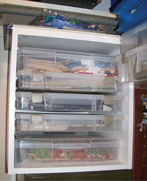 Figure 08: Photograph showing clear plastic boxes of supplies.