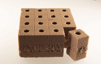 Photograph of a cube of Oasis plugs.