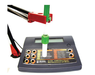 Photograph of a bench-top pH meter with probe