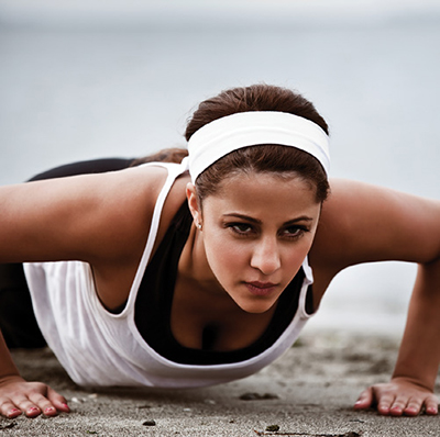 Photograph of a person doing a pushup.