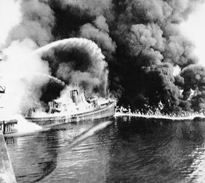Photograph of a fire on the Cuyahoga River in Cleveland, Ohio, in 1952.