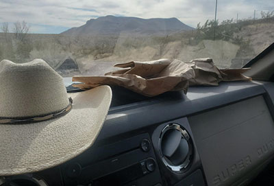 Fig. 11: Photograph of a paper bag on a vehicle dashboard.