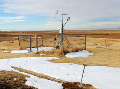 Photograph showing southwest view of the NMCC weather station (WS-2) at the NMSU Agricultural Science Center at Farmington, NM, in January 2013.